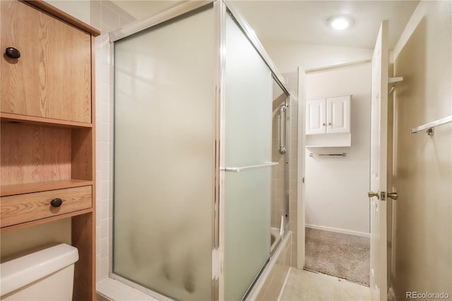 5010 Sunsuite Trl, Colorado Springs, CO 80917 - full bath with toilet, tile patterned flooring, and bath / shower combo with glass door