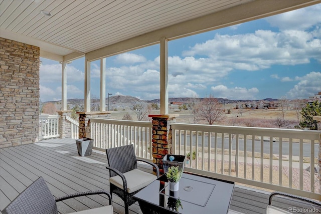 deck with a mountain view