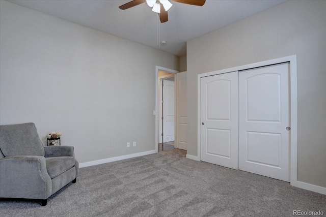 unfurnished room with carpet flooring, baseboards, and ceiling fan