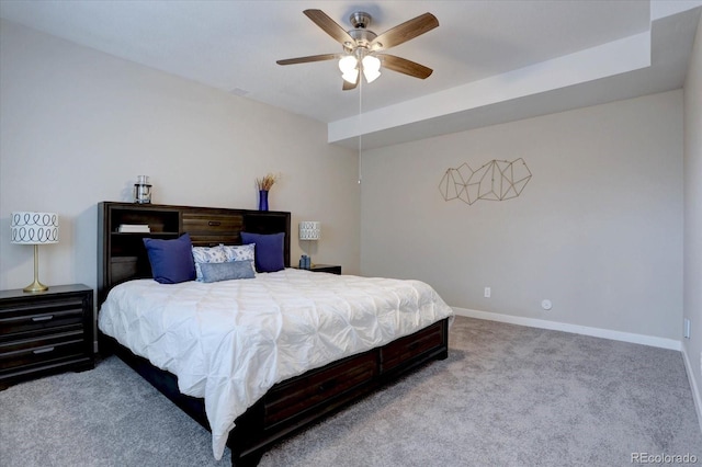 bedroom with carpet, baseboards, and ceiling fan