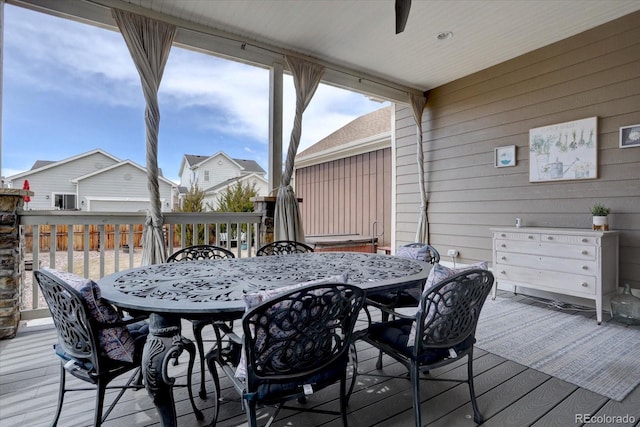 wooden deck with outdoor dining space