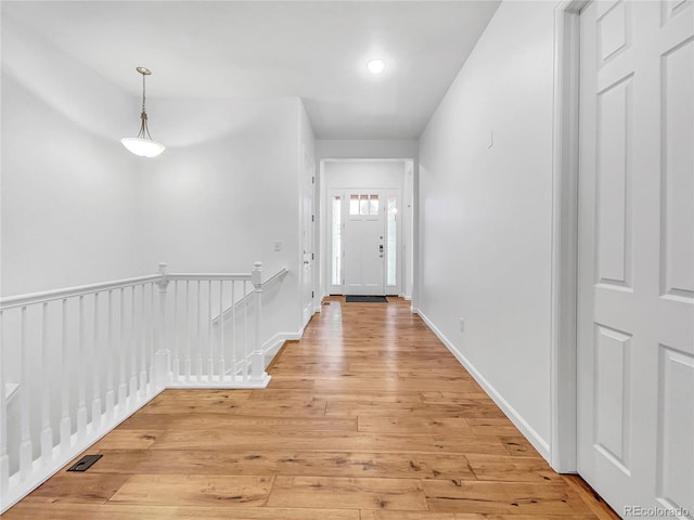 corridor featuring light wood-type flooring