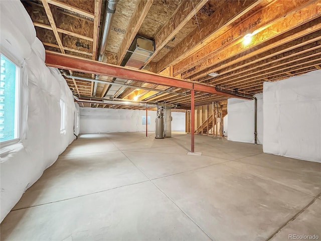 basement featuring gas water heater