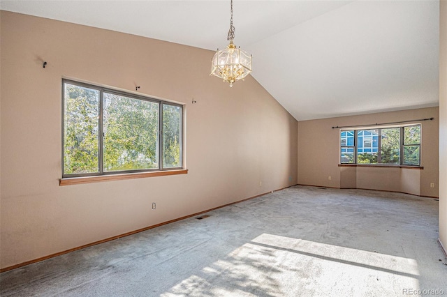 17583 E Belleview Pl, Centennial, CO 80015 - spare room with a chandelier, vaulted ceiling, and carpet flooring