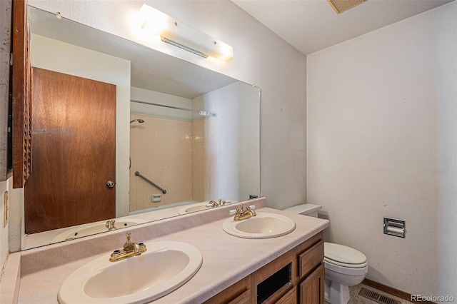 17583 E Belleview Pl, Centennial, CO 80015 - bathroom featuring double vanity and toilet