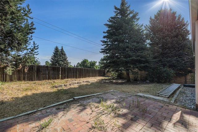 17583 E Belleview Pl, Centennial, CO 80015 - fenced backyard featuring a patio area