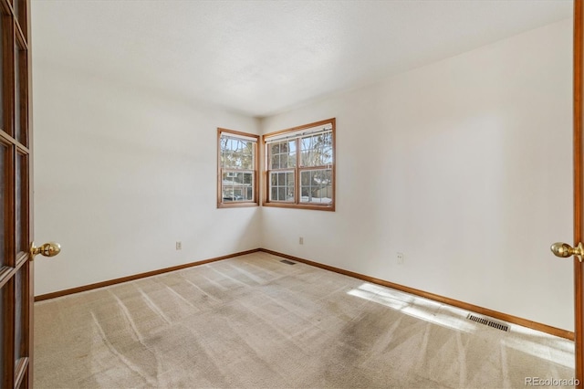 view of carpeted spare room