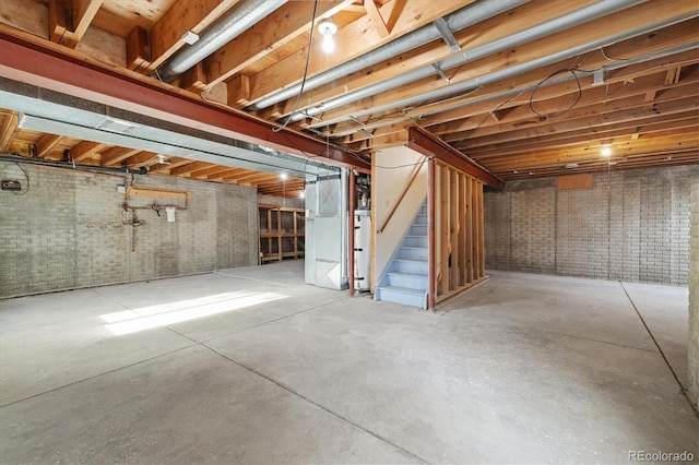 basement with brick wall