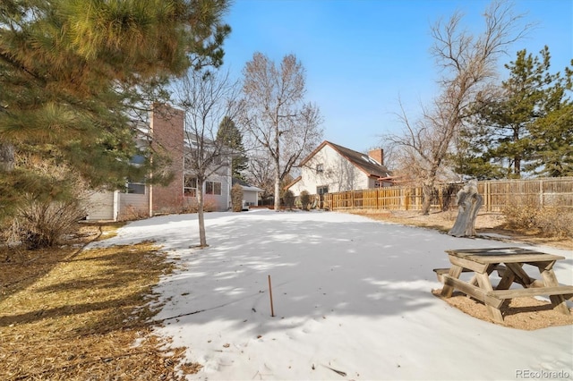 view of snowy yard