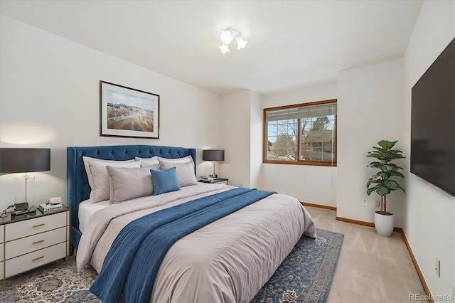 bedroom with light colored carpet