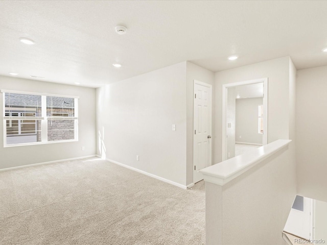20982 E 66th Ave, Aurora, CO 80019 - spare room featuring recessed lighting and light carpet