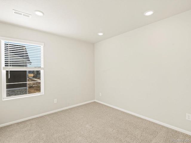20982 E 66th Ave, Aurora, CO 80019 - carpeted spare room with baseboards, visible vents, and recessed lighting