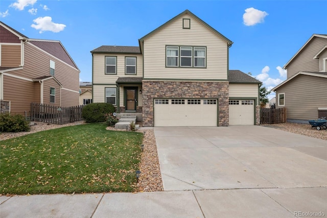 front of property with a garage and a front lawn