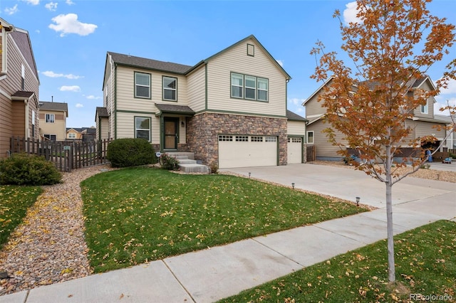 view of front of house featuring a front lawn and a garage