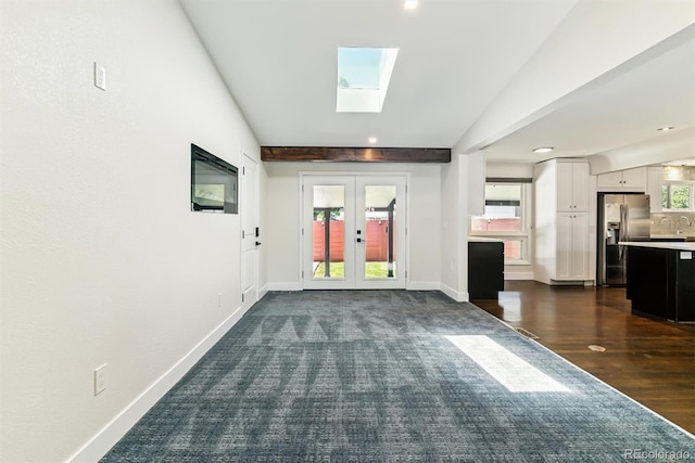 5480 W Iowa Ave, Lakewood, CO 80232 - entrance foyer with a skylight, french doors, recessed lighting, and dark wood-type flooring