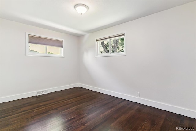 5480 W Iowa Ave, Lakewood, CO 80232 - empty room featuring dark wood-style floors