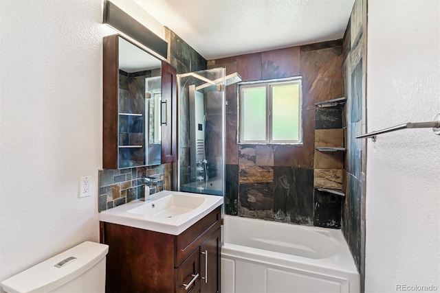 5480 W Iowa Ave, Lakewood, CO 80232 - full bath featuring vanity, a textured wall, and shower / bathtub combination