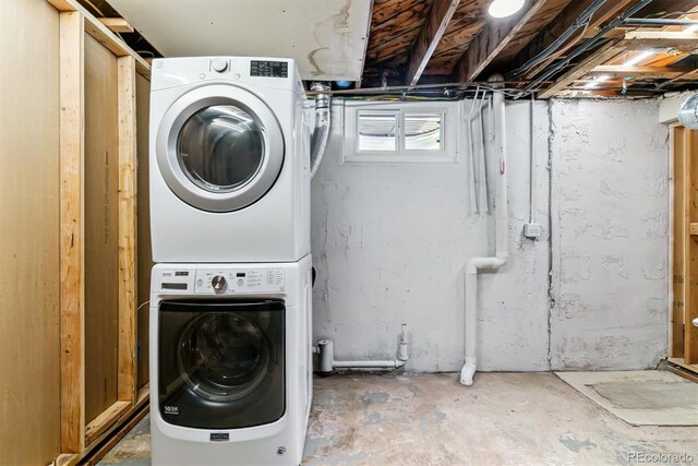 5480 W Iowa Ave, Lakewood, CO 80232 - laundry area with stacked washing machine and dryer