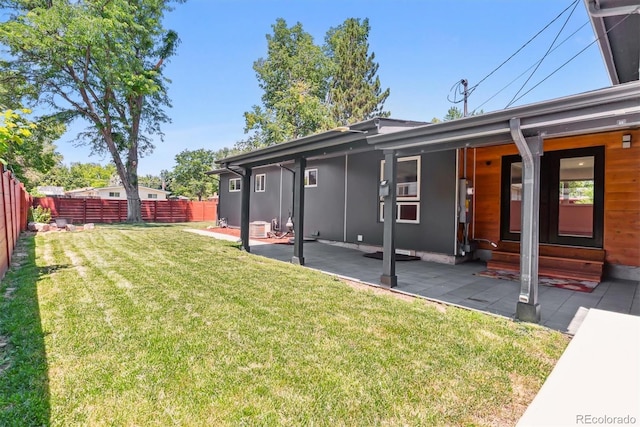 5480 W Iowa Ave, Lakewood, CO 80232 - fenced yard featuring a patio