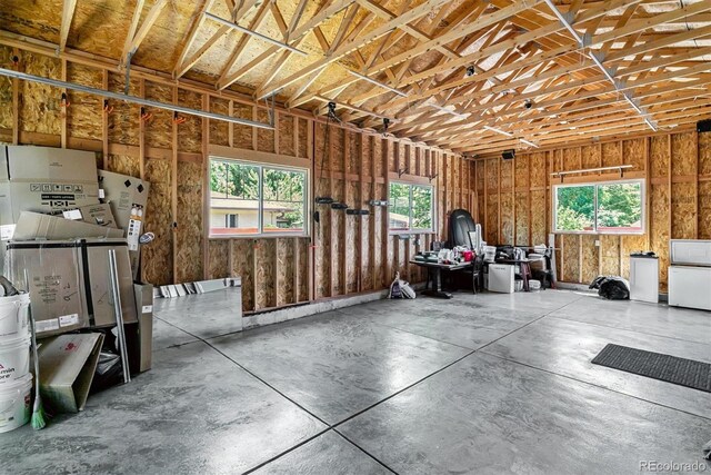5480 W Iowa Ave, Lakewood, CO 80232 - misc room featuring concrete floors and a garage