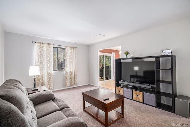 7746 W Quarto Dr, Littleton, CO 80128 - living area featuring baseboards and carpet