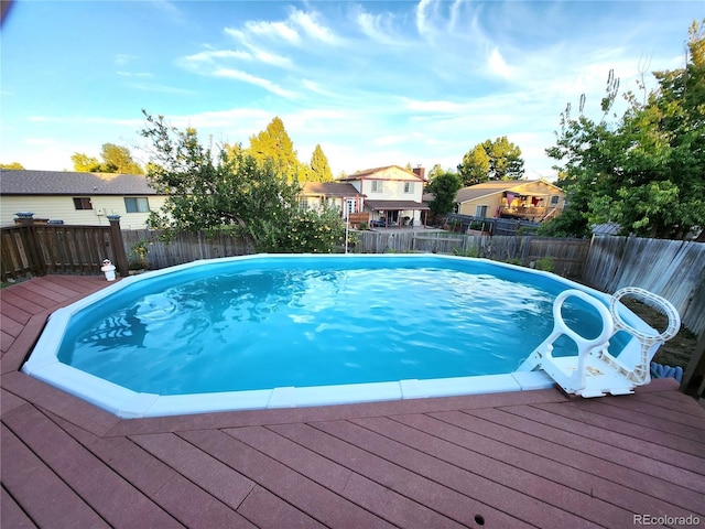 view of pool with a fenced backyard and a fenced in pool