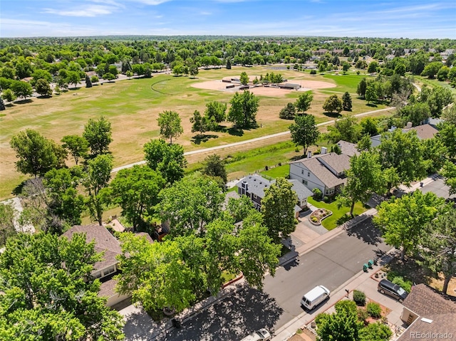 16085 E Lehigh Cir, Aurora, CO 80013 - aerial perspective of suburban area with a golf club and a tree filled landscape