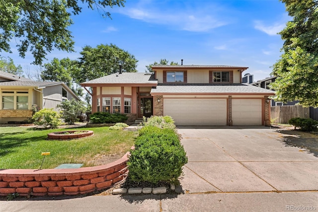 16085 E Lehigh Cir, Aurora, CO 80013 - view of front facade with concrete driveway, brick siding, and a garage