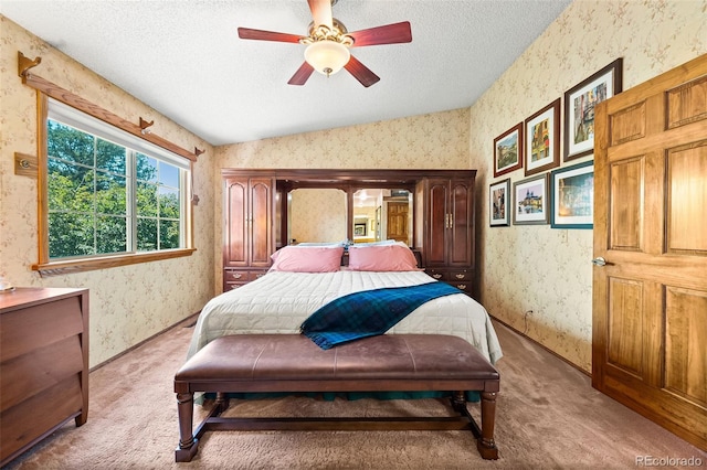 16085 E Lehigh Cir, Aurora, CO 80013 - bedroom featuring wallpapered walls, light carpet, a textured ceiling, vaulted ceiling, and a ceiling fan