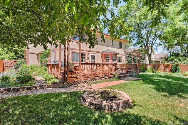 16085 E Lehigh Cir, Aurora, CO 80013 - back of house with a fenced backyard and a wooden deck