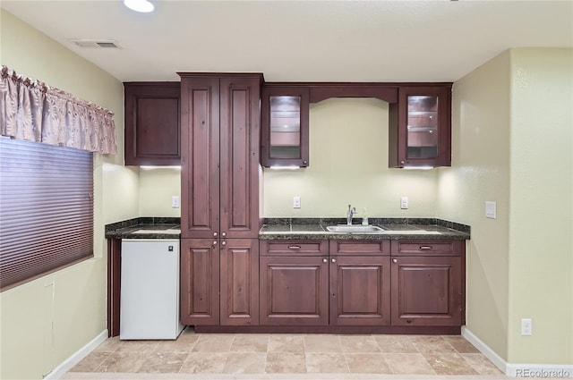 kitchen with sink and fridge