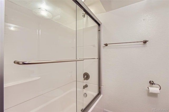 bathroom featuring enclosed tub / shower combo