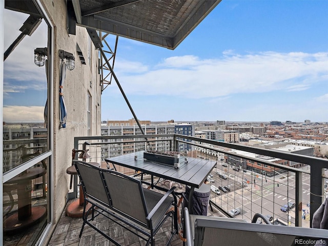 balcony featuring a view of city