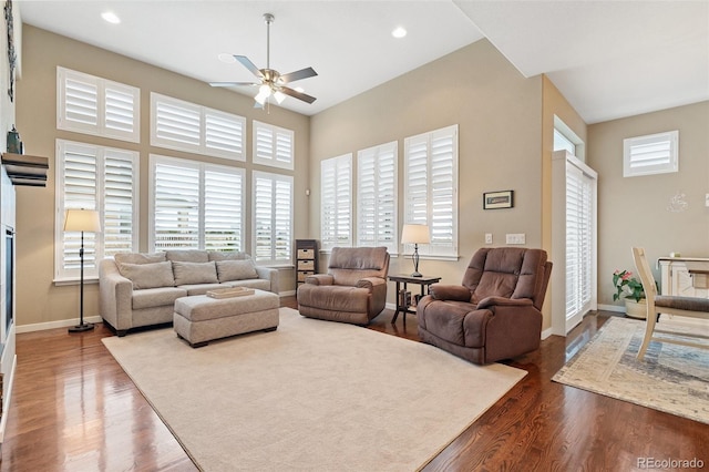 living room featuring recessed lighting, wood finished floors, a ceiling fan, and baseboards