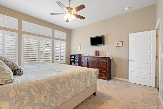 bedroom featuring ceiling fan, baseboards, and carpet flooring