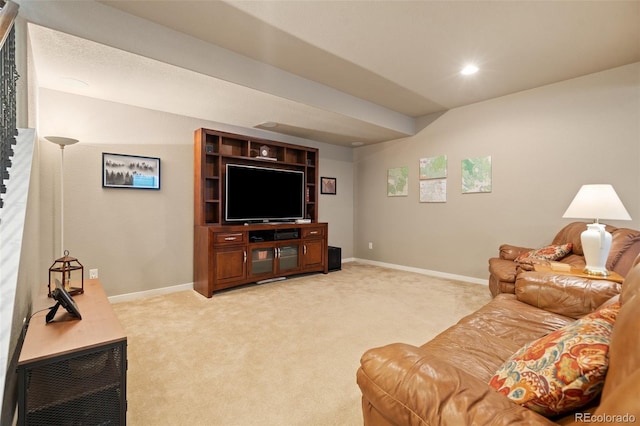 living room with recessed lighting, light carpet, and baseboards