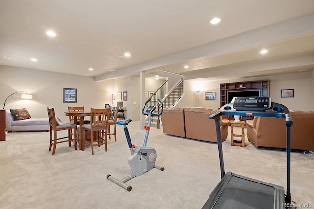 exercise area with carpet flooring and recessed lighting