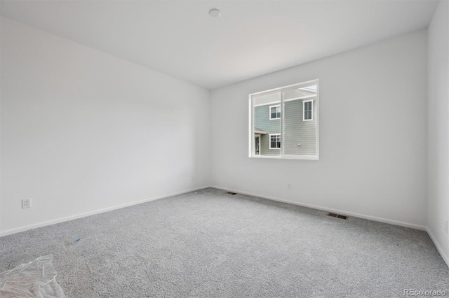 6625 N Nepal St, Aurora, CO 80019 - carpeted empty room featuring baseboards and visible vents