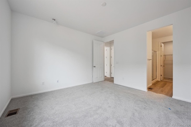 6625 N Nepal St, Aurora, CO 80019 - interior space with carpet, baseboards, and visible vents