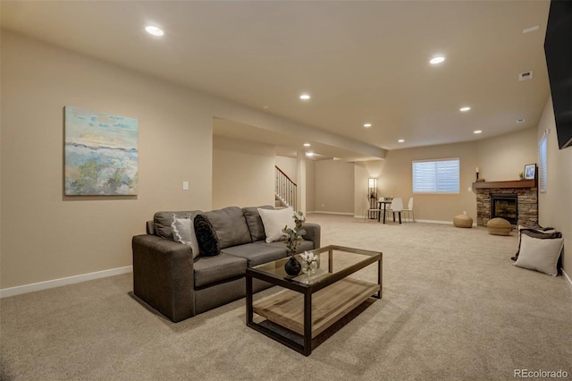 living area with recessed lighting, stairway, baseboards, and light colored carpet