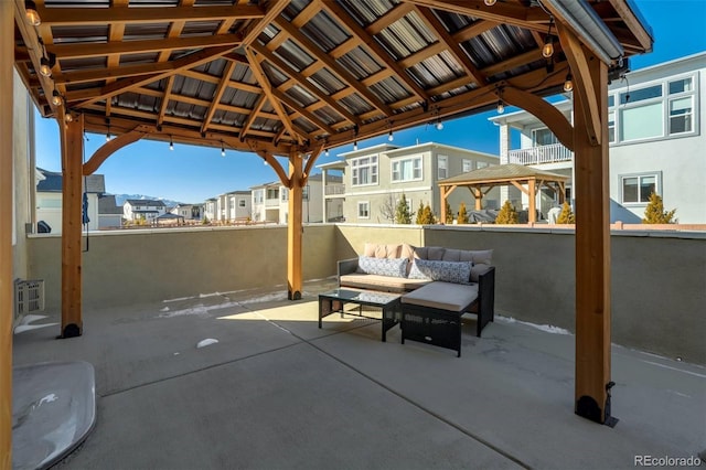 view of patio / terrace with an outdoor hangout area and a gazebo