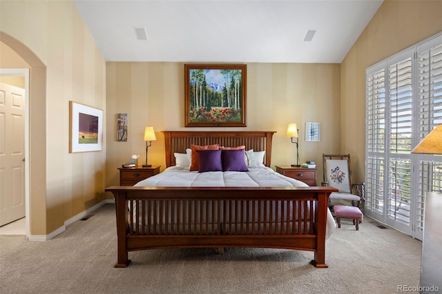 4373 E Phillips Pl, Centennial, CO 80122 - bedroom featuring carpet floors, multiple windows, and arched walkways