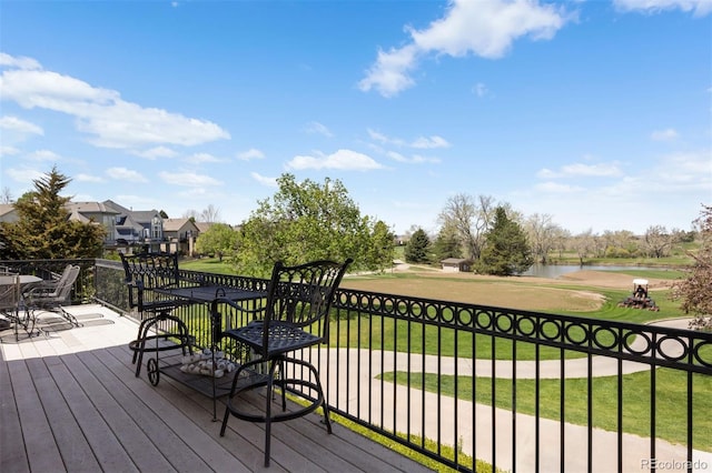 4373 E Phillips Pl, Centennial, CO 80122 - deck with view of golf course, a water view, and a yard