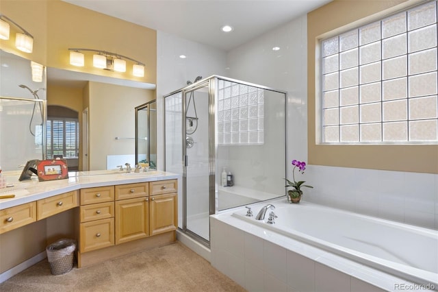 4373 E Phillips Pl, Centennial, CO 80122 - full bathroom featuring vanity, recessed lighting, a bath, and a stall shower