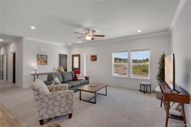 6986 Marshbern Ct, Colorado Springs, CO 80908 - living area featuring light colored carpet, a ceiling fan, recessed lighting, and crown molding