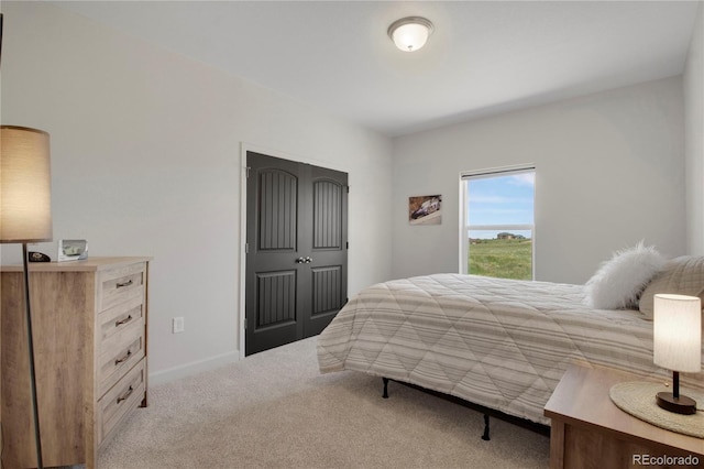6986 Marshbern Ct, Colorado Springs, CO 80908 - bedroom featuring carpet flooring and baseboards