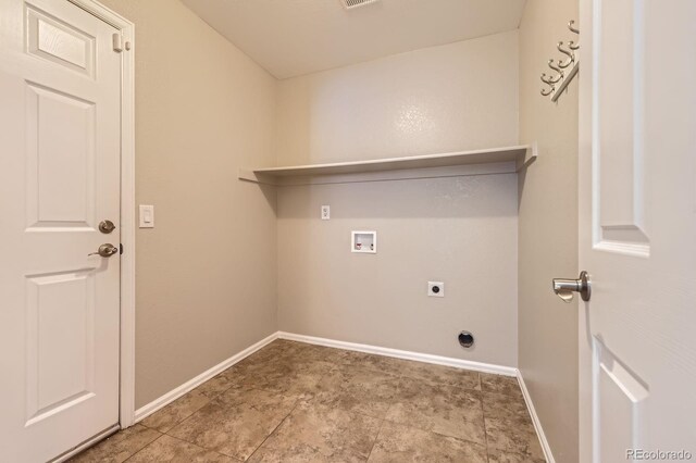 laundry room featuring electric dryer hookup, hookup for a washing machine, and baseboards