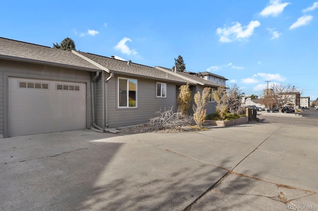 view of home's exterior with a garage