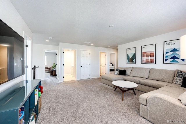 living room with light colored carpet