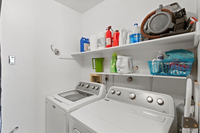 laundry room with separate washer and dryer